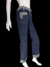 Load image into Gallery viewer, Mannequin wearing blue jeans with a plain background
