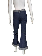 Load image into Gallery viewer, Mannequin wearing blue bell-bottom pants with a white background