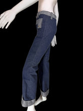 Load image into Gallery viewer, Mannequin wearing blue jeans with a plain background