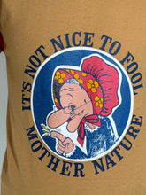 Load image into Gallery viewer, T-shirt with graphic design of a cartoon character and text 'It's not nice to fool Mother Nature'