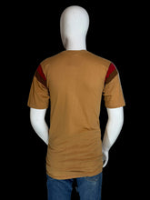 Load image into Gallery viewer, Mannequin wearing a brown t-shirt with red and black accents on a white background