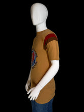 Load image into Gallery viewer, Mannequin wearing a brown t-shirt with a logo on a plain background