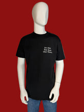 Load image into Gallery viewer, Black t-shirt with text on a mannequin against a plain background