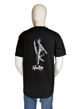 Load image into Gallery viewer, Black t-shirt with a graphic design on the back worn by a mannequin against a plain background