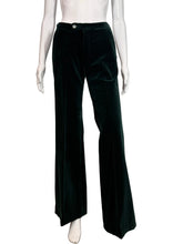Load image into Gallery viewer, Dark green velvet pants displayed on a mannequin against a neutral background