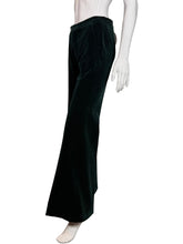 Load image into Gallery viewer, Dark green velvet pants displayed on a mannequin against a neutral background