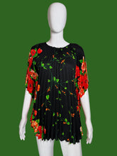 Load image into Gallery viewer, Black dress with red floral pattern on a mannequin