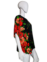Load image into Gallery viewer, Black dress with red floral pattern on a mannequin