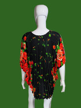 Load image into Gallery viewer, Black dress with red floral pattern on a mannequin