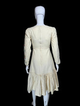 Load image into Gallery viewer, Vintage cream-colored dress with floral pattern on a mannequin