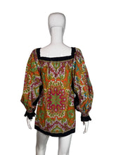 Load image into Gallery viewer, Colorful patterned dress on a mannequin against a gray background