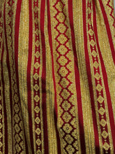 Load image into Gallery viewer, Red and gold striped fabric with intricate patterns