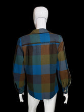 Load image into Gallery viewer, Plaid-patterned garment on a mannequin