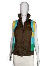 Load image into Gallery viewer, Mannequin wearing a colorful puffy vest on a plain background