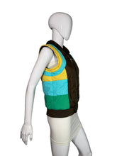 Load image into Gallery viewer, Mannequin wearing a colorful puffy vest on a plain background