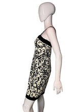 Load image into Gallery viewer, Mannequin wearing a black and white patterned dress on a white background