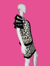 Load image into Gallery viewer, Black and white patterned garment on a mannequin against a plain background