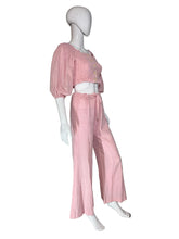 Load image into Gallery viewer, Mannequin wearing pink pants on a white surface