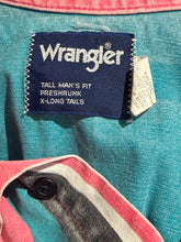 Load image into Gallery viewer, Close-up of a Wrangler label on a denim shirt with pink and black stripes