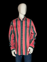 Load image into Gallery viewer, Mannequin wearing a red and blue striped shirt with a plain background