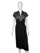 Load image into Gallery viewer, Black dress with butterfly pattern on a mannequin