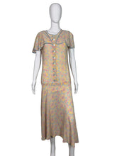 Load image into Gallery viewer, Mannequin wearing a floral dress against a plain background