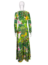 Load image into Gallery viewer, Green floral Jumpsuit on a mannequin against a white wall