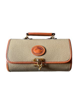 Load image into Gallery viewer, Leather Handbag with a Dooney & Bourke logo on a gray surface