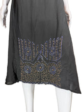 Load image into Gallery viewer, Black dress with intricate beading on a mannequin against a plain background