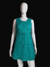 Load image into Gallery viewer, Teal knitted garment on a mannequin against a white background.