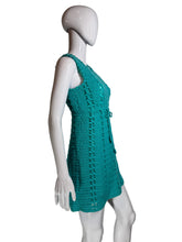 Load image into Gallery viewer, Teal crochet dress on a white mannequin against a plain background.