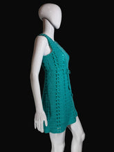 Load image into Gallery viewer, Teal crochet dress on a white mannequin against a plain background.