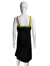 Load image into Gallery viewer, Black dress with colorful trim on a white mannequin against a neutral background.