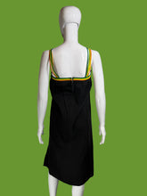 Load image into Gallery viewer, Black dress with colorful trim on a white mannequin against a neutral background.