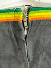 Load image into Gallery viewer, Black fabric with a zipper and colorful trim.