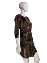 Load image into Gallery viewer, Mannequin wearing a patterned dress against a plain background.