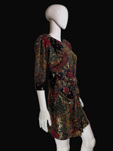 Load image into Gallery viewer, Mannequin wearing a patterned dress against a plain background.