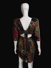 Load image into Gallery viewer, Mannequin wearing a patterned dress with a plain background.