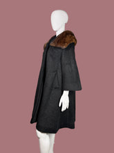 Load image into Gallery viewer, Mannequin wearing a dark coat with fur trim on a plain background