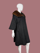 Load image into Gallery viewer, Black coat with brown fur collar on a mannequin against a neutral background