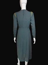 Load image into Gallery viewer, Teal dress on a mannequin against a plain wall.