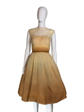 Load image into Gallery viewer, Mannequin wearing a beige gown on a white background.
