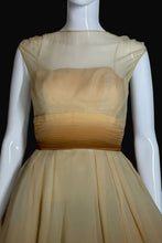 Load image into Gallery viewer, Close-up of a beige dress.
