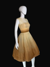 Load image into Gallery viewer, Mannequin wearing a beige dress on a white background.