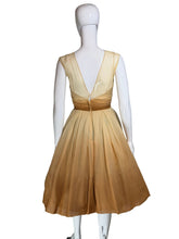Load image into Gallery viewer, Mannequin wearing a beige dress against a plain wall.