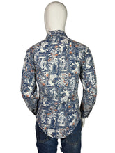 Load image into Gallery viewer, Mannequin wearing a patterned shirt on a plain background