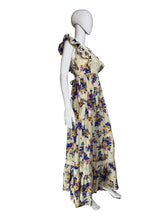 Load image into Gallery viewer, Floral dress on a mannequin against a plain wall.