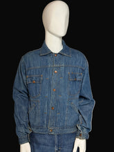 Load image into Gallery viewer, Blue denim jacket on a mannequin against a plain background