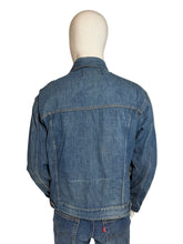 Load image into Gallery viewer, Blue denim jacket on a mannequin against a plain background.