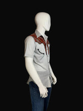 Load image into Gallery viewer, Gray shirt with plaid shoulder accents on a mannequin against a plain background